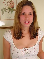 Young looking sweet naive teen with hairy pussy exposes her big boobies